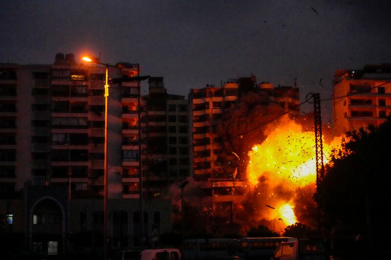 Smoke and flames erupt from an Israeli airstrike that targeted a building in Tayouneh, Beirut (Hassan Ammar/AP)