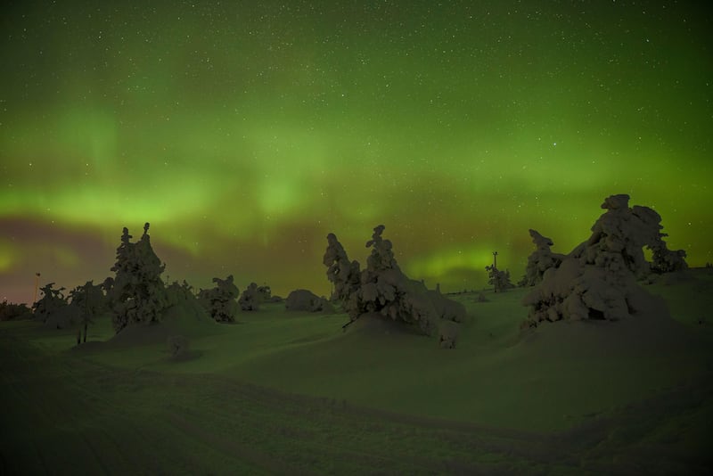 Northern lights over Levi Mountain and ski resort