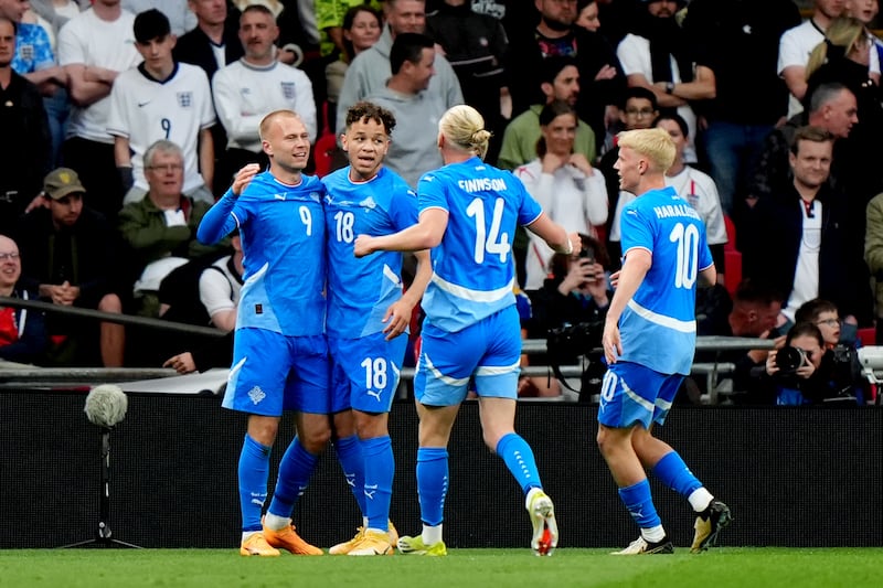 Iceland’s Jon Dagur Thorsteinsson (left) is congratulated after scoring a Wembley winner against England in June