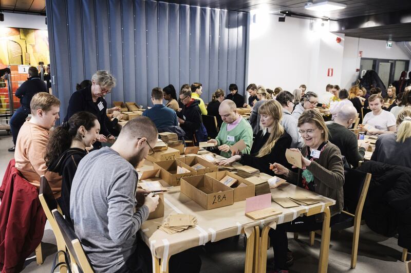 Preliminary votes of the second round of the Finnish presidential election are counted in Helsinki (Roni Rekomaa/Lehtikuva/AP)