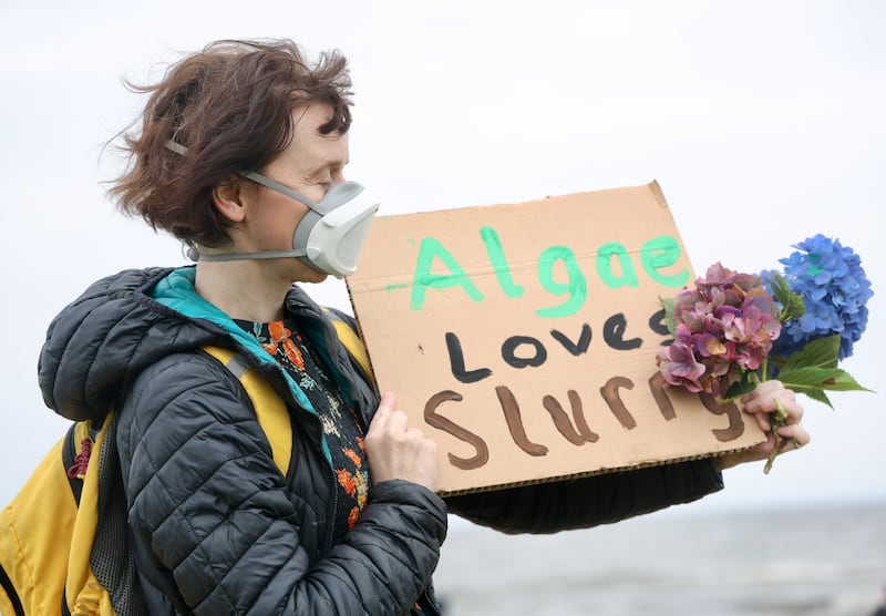 A protester at a wake that was held for Lough Neagh to highlight the concerns surrounding blue green algae which continues to plague the lake. Picture Mal McCann