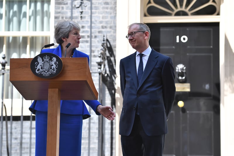 Former prime minister Theresa May announcing her resignation alongside her husband Philip May