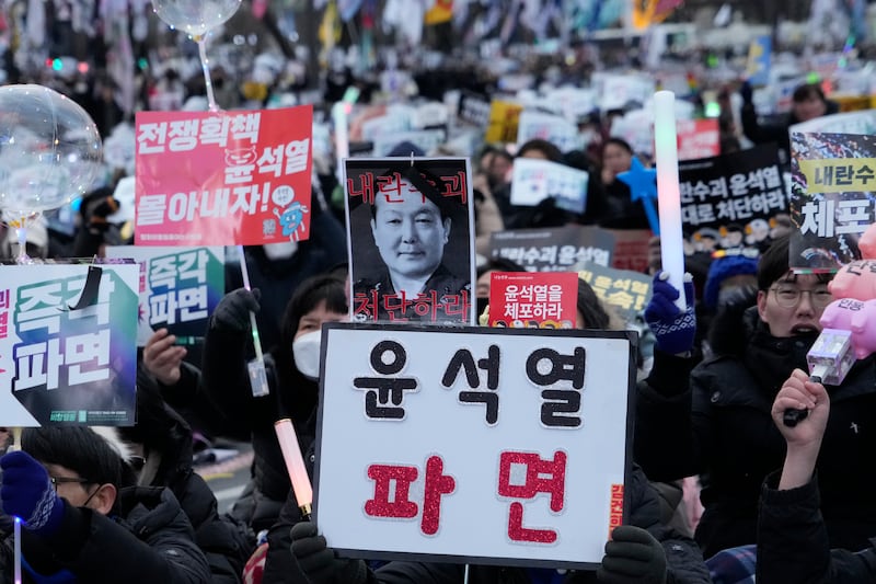 Protesters attend a rally demanding the arrest of impeached South Korean President Yoon Suk Yeol in Seoul, South Korea (AP/Ahn Young-joon)