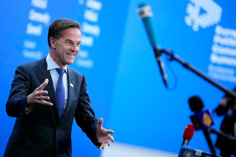 Nato secretary-general Mark Rutte speaks with the media as he arrives for the European Political Community Summit at the Puskas Arena in Budapest (Petr Josek/AP)