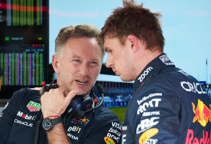 Red Bull team principal Christian Horner chats with Max Verstappen (Paul Chiasson /The Canadian Press via AP)