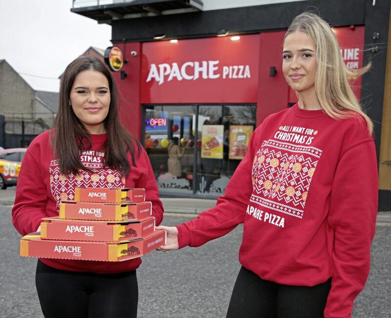 Apache Pizza has opened its 200th store on the island of Ireland in Longford town. Pictured at the store opening are Abbie Murray and Maelisa Bellany, customer service representatives at the food group. 