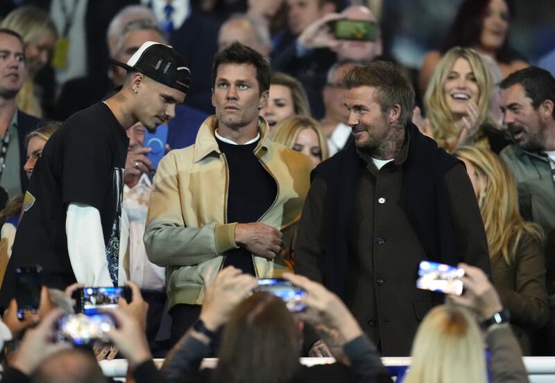 Tom Brady, centre, with David Beckham