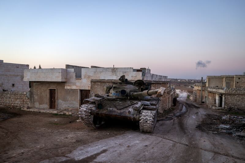 A destroyed Syrian army tank in the village of Anjara (Omar Albam/AP)