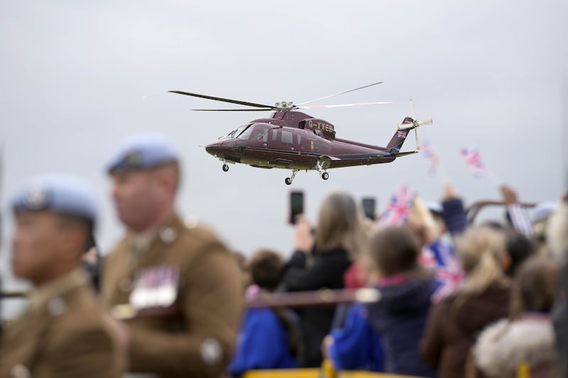 The King arriving by helicopter at the Army Aviation Centre