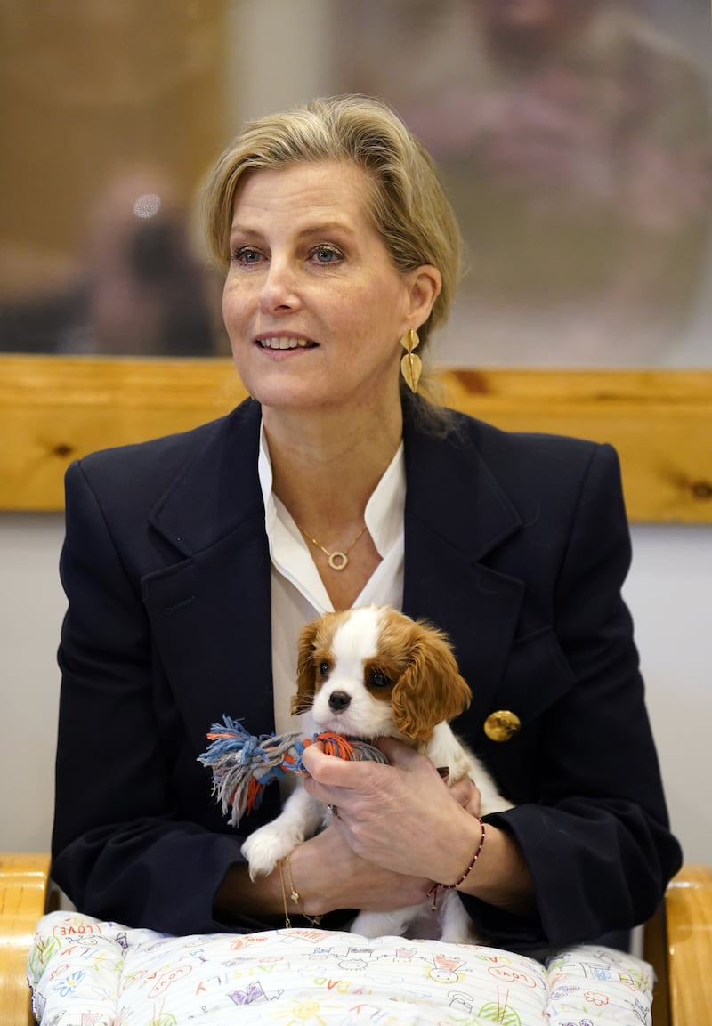 Nine-week-old Lord Louis of Spudringham sits on the Duchess of Edinburgh’s lap