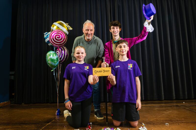 BSPA director Peter Corry pictured with Michael Nevin (Willy Wonka), Aimee Toner and Max Reid (Charlie) ahead of their summer performance of Charlie and the Chocolate Factory