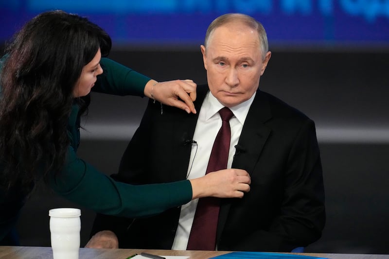 Vladimir Putin prepares for his annual news conference and call-in show (Alexander Zemlianichenko/AP)