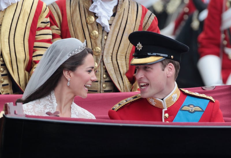 Newlywed William and Kate in the carriage procession after their wedding at Westminster Abbey
