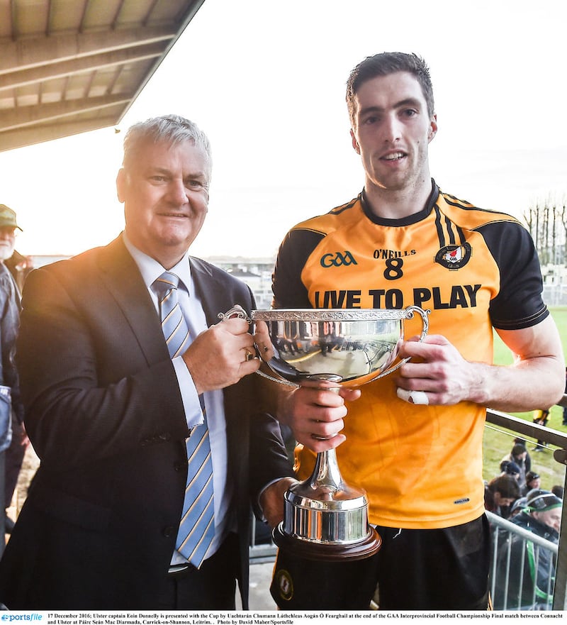 Ulster captain Eoin Donnelly is presented with the Railway Cup in 2016 by Uachtar&aacute;n Chumann L&uacute;thchleas Aog&aacute;n &Oacute; Fearghail Picture by David Maher/Sportsfile