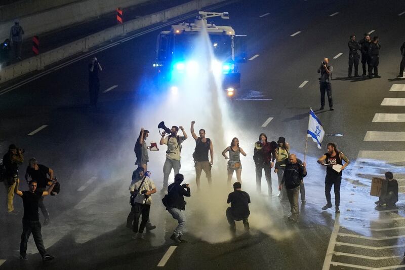 New protests took place in Tel Aviv on Saturday against Israeli Prime Minister Benjamin Netanyahu’s government (Maya Alleruzzo/AP)