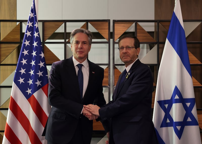 US Secretary of State Antony Blinken, left, meets with Israel’s President Isaac Herzog, in Tel Aviv, Israel (Kevin Mohatt/AP)