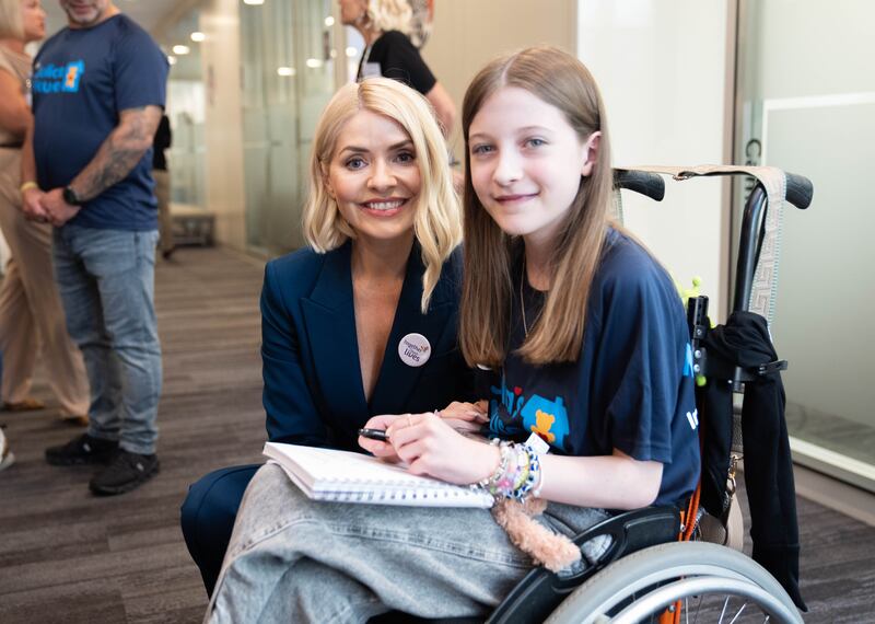 Holly Willoughby meets 11-year-old Sophie Joscelyne during the BGC annual charity day