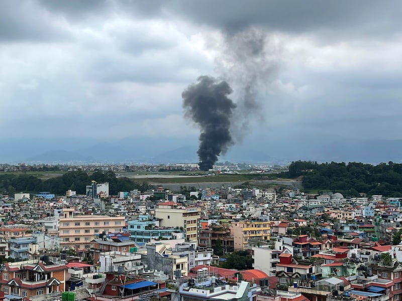 The pilot was the lone survivor of a plane crash at Kathmandu airport (AP Photo/Agniia Galdanova)