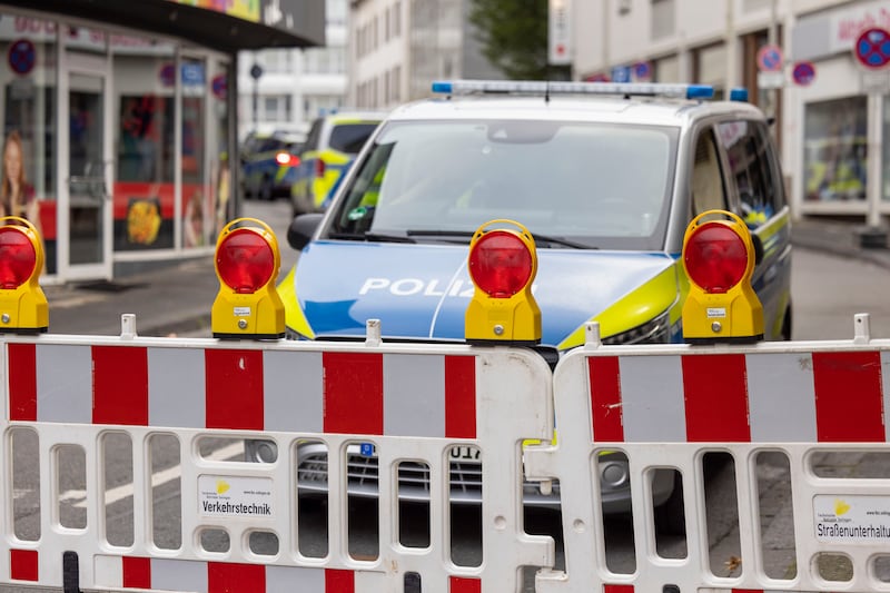 Police emergency vehicles at a cordon in the centre of Solingen, Germany (Thomas Banneyer/dpa/AP)