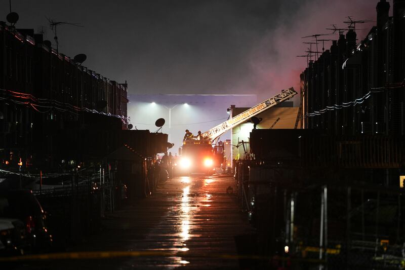 First responders at the scene after a small plane crashed in Philadelphia (Matt Rourke/AP)