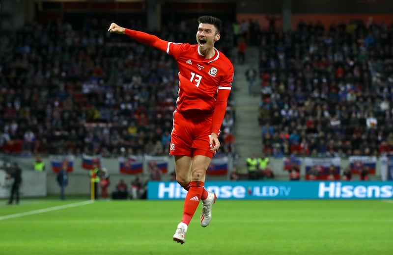 Kieffer Moore celebrates after scoring against Slovakia in October 2019