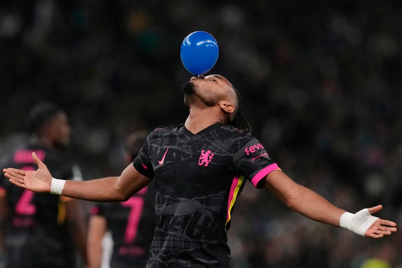 Christopher Nkunku celebrates a goal (Petros Giannakouris/AP)