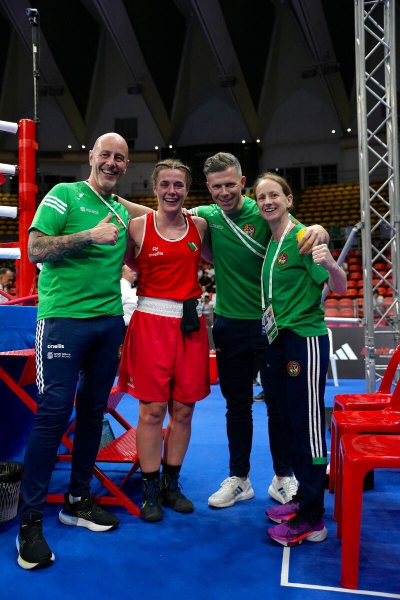 Grainne Walsh celebrates with the Irish coaches after Friday's victory. Picture by Tara Robins Mari
