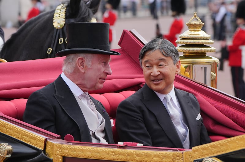 The King and Emperor Naruhito of Japan travel together in the lead coach
