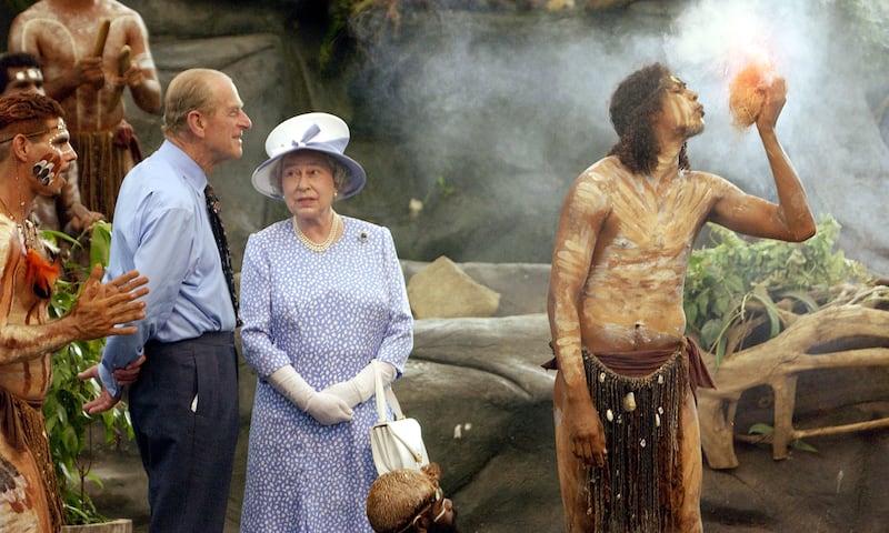 The Queen and Philip watch a culture show at Tjapukai Aboriginal Culture Park, Cairns, in 2002