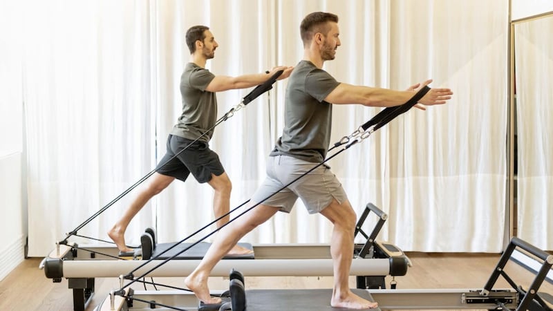 More Men Are Giving Pilates a Try for Strength, Flexibility, and