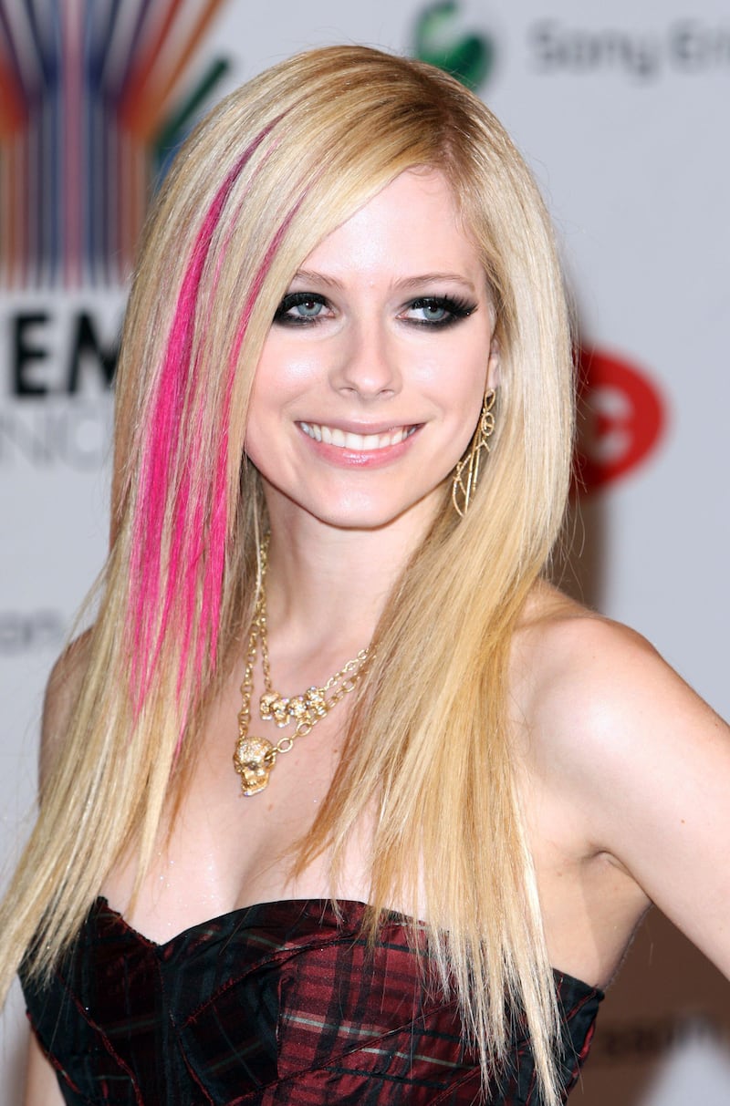 Avril Lavigne was known for her chunky pink highlights throughout the 2000s