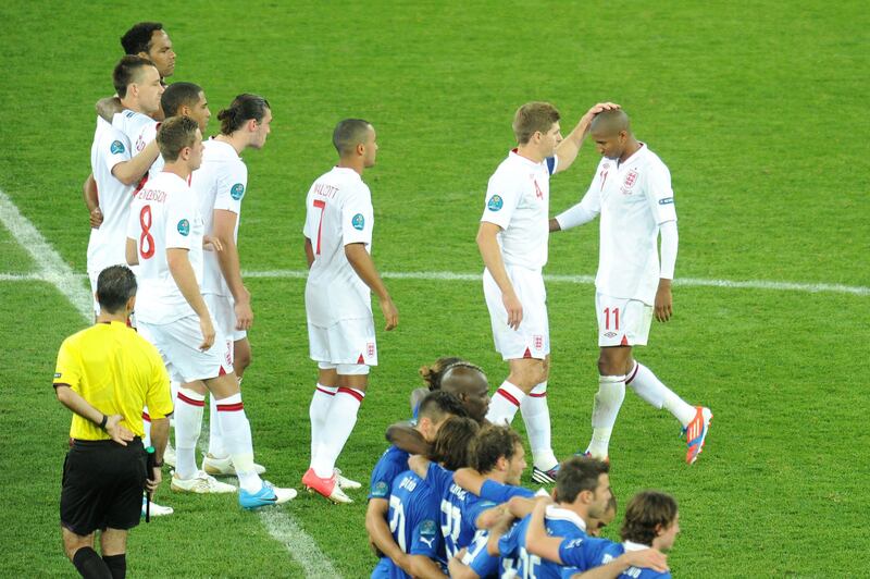 Steven Gerrard consoles Ashley Young after missing his penalty