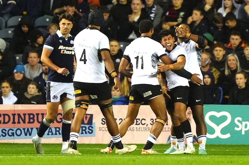 Fiji celebrate scoring a try but it was Scotland who ran out convincing winners