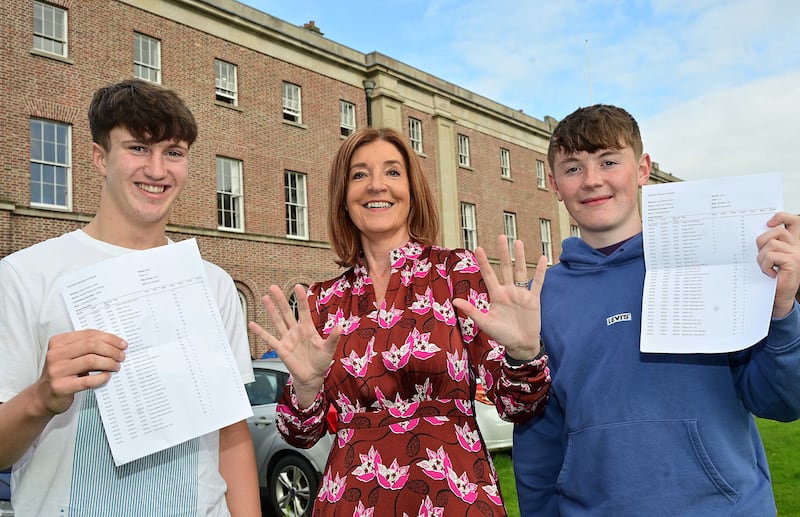 Pacemaker Press Belfast 22-08-2024: There has been a fall in the percentage of people receiving top GCSE grades in Northern Ireland in 2024 compared to last year.
About 31% of students achieved grade A and above, compared to the pre-pandemic levels of 30.5% in 2019.
10 A Stars GCSE students Jonah Power and Luke Holland from Royal Belfast Academical Institution in Belfast pictured receiving there results on Thursday with principal Janet Williamson.
Picture By: Arthur Allison/Pacemaker Press.