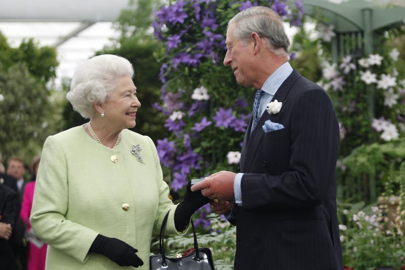 The now-King, pictured with his late mother, and the Prime Minister will have final approval on the design of the memorial (Sang Tan/PA