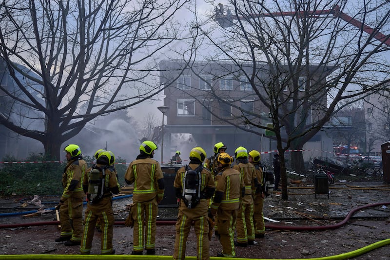 It is unclear how many were injured, and how many are still in the rubble (AP)