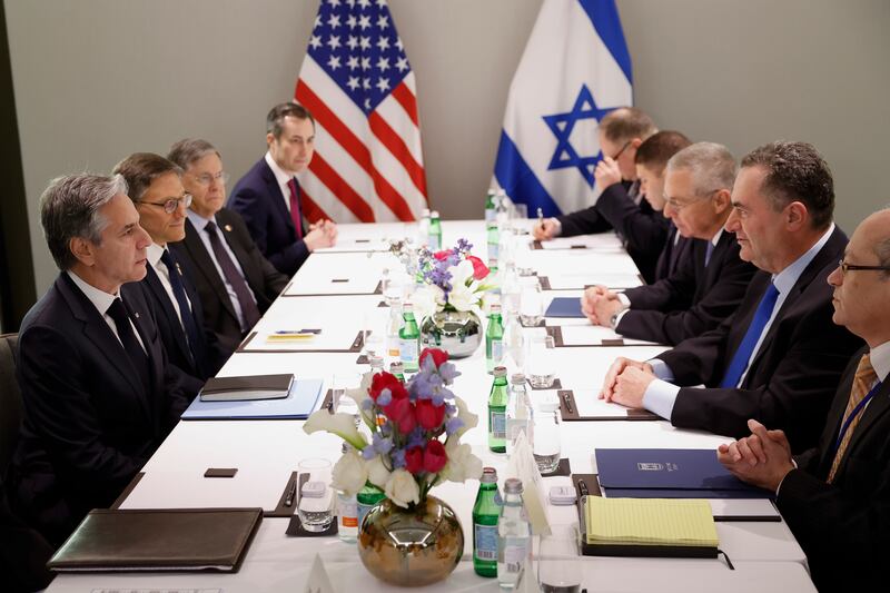 US Secretary of State Antony Blinken, left, attends a meeting with Israel’s Foreign Minister Israel Katz, second right, in Tel Aviv (Evelyn Hockstein/Pool Photo via AP)