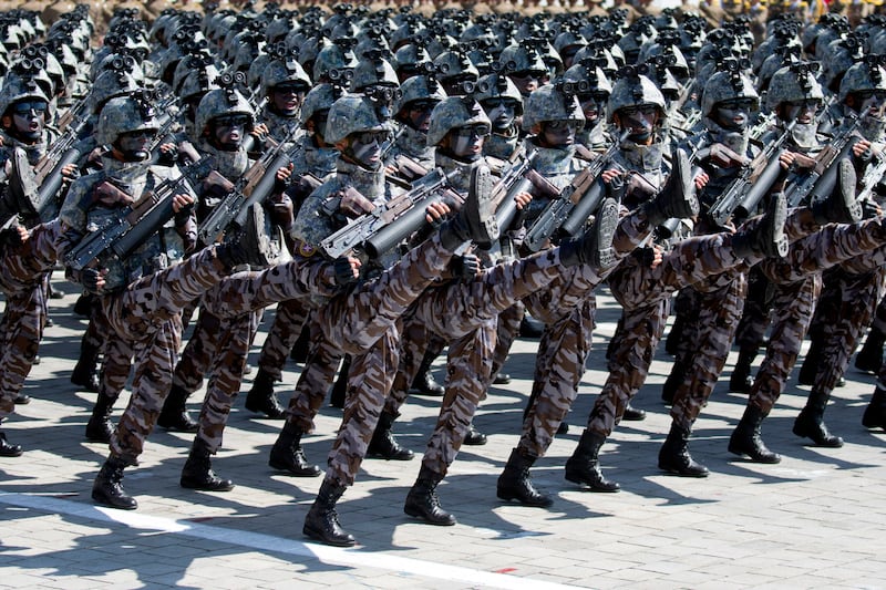 Soldiers march in a parade for the 70th anniversary of North Korea’s founding day in Pyongyang (Ng Han Guan/AP)