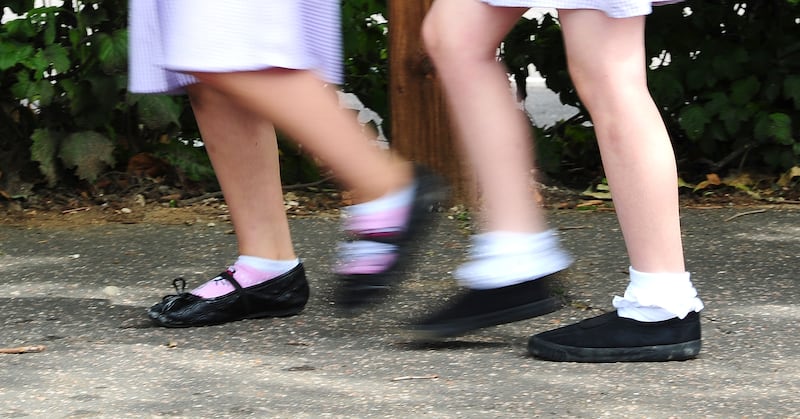 Schoolgirls walking to school