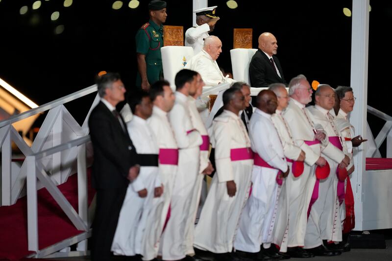 Pope Francis and Papua New Guinea’s deputy prime minister John Rosso at Jackson’s International Airport in Port Moresby on Friday (Mark Baker/AP)