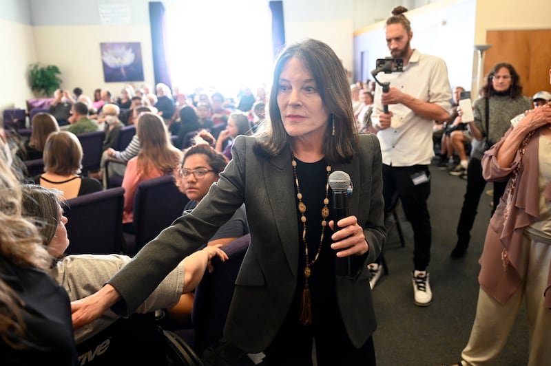 Self-help author Marianne Williamson called for ‘a vision of justice and love’ as she entered the Democratic primary (Jose Juarez/AP)