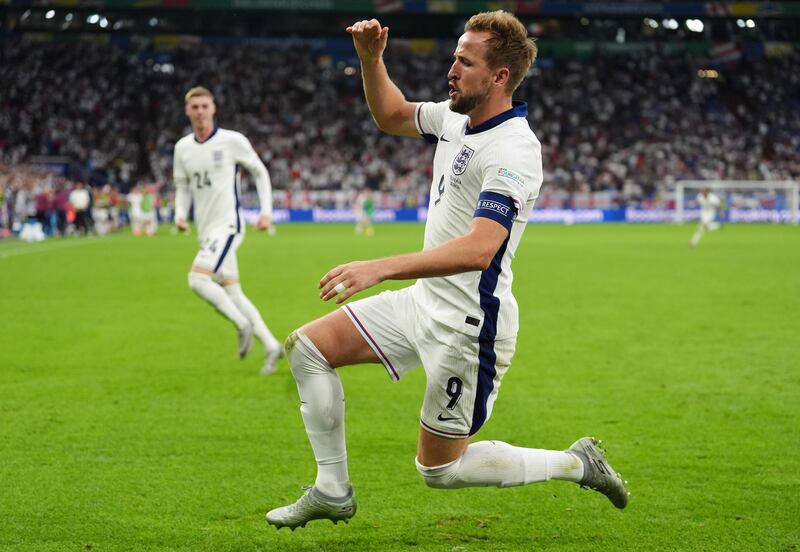 England’s Harry Kane celebrates after scoring against Slovakia