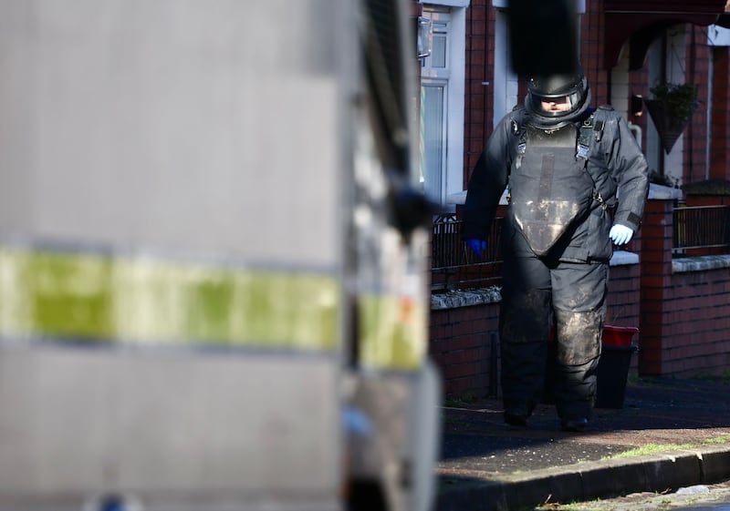 Police and Army Technical Officers remained at the scene on Empire Street on Wednesday afternoon. PICTURE: MAL MCCANN