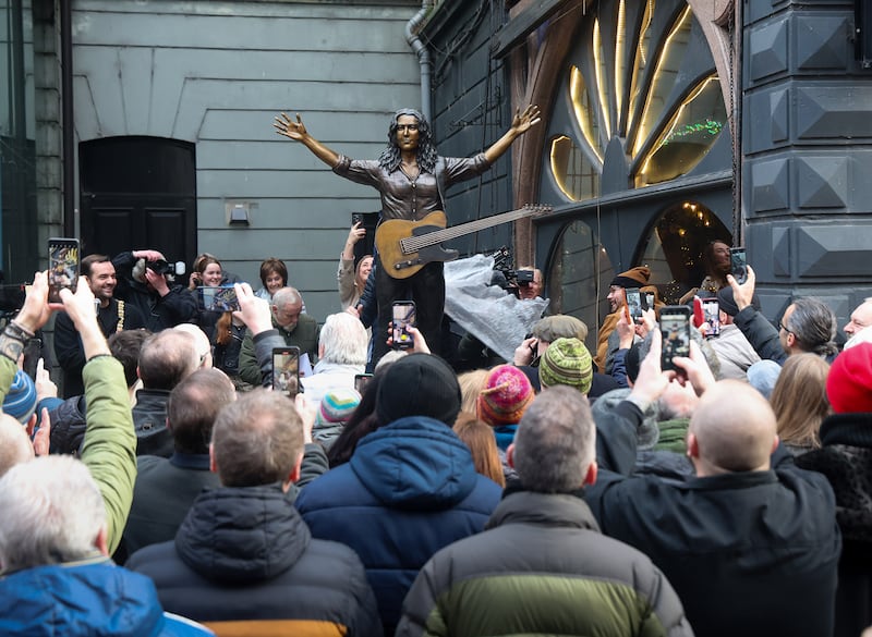 A commemorative statue of legendary composer and musician Rory Gallagher was revealed today at Ulster Hall, honouring his life, music, and his deep connection to Belfast. 
Crafted by renowned sculptors Anto Brennan, Jessica Checkley of Bronze Art Ireland, and David O’Brien of Bronze Art Ireland. It is inspired by a January 1972 Melody Maker magazine cover shot of Rory onstage at Ulster Hall. PICTURE: MAL MCCANN