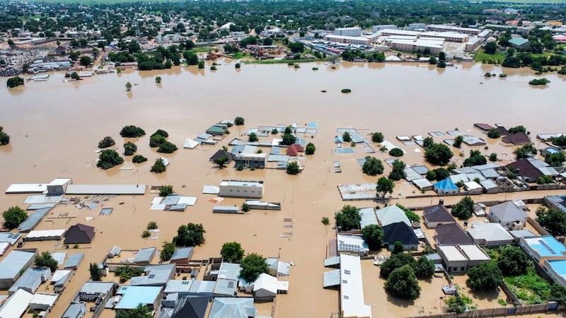 Houses are partially submerged following a dam collapse in Maiduguri, Nigeria (Musa Ajit Borno/AP)