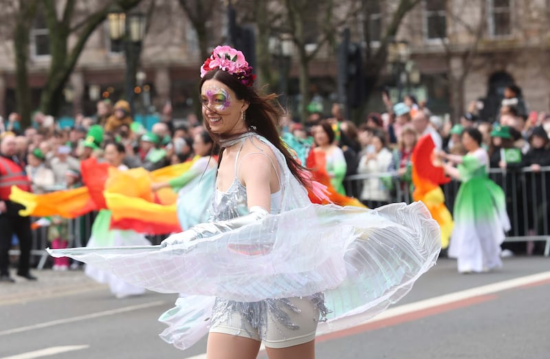 Performers entertain the crowd as  Thousands line the streets for the St Patrick’s day Parade in Belfast on Sunday.
PICTURE COLM LENAGHAN