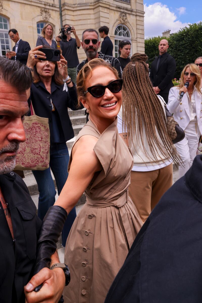 Jennifer Lopez smiles to crowds in Paris (Vianney Le Caer/Invision/AP)