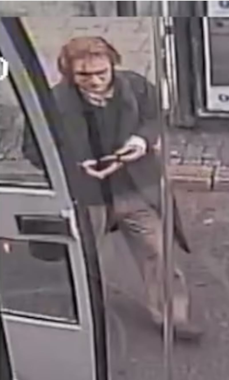 Lester McLennan pictured boarding a bus in Belfast heading towards the Giant's Causeway.