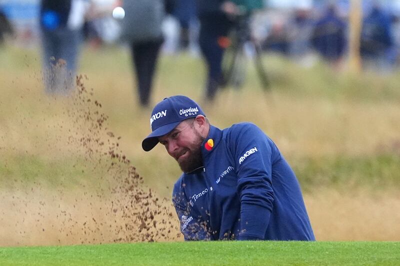 Shane Lowry chips out of a bunker on the 16th during day one of The Open at Royal Troon