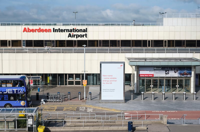 Around 100 staff at Aberdeen Airport will be among those balloted for industrial action